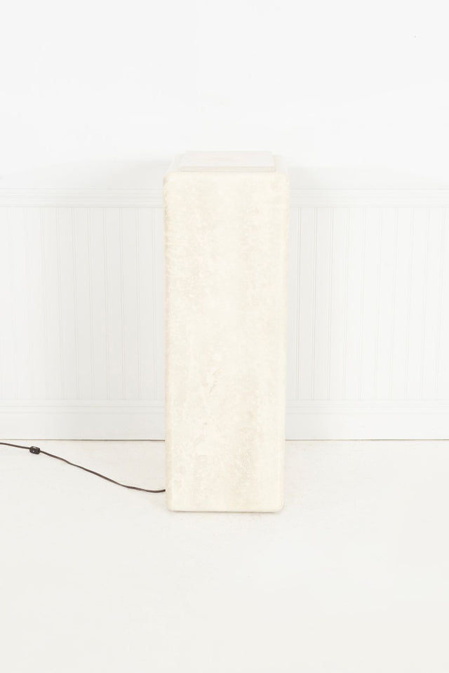 Illuminating Faux Travertine Pedestal