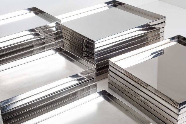 Phillipe Starck Custom Stainless Steel Dishes, set of Thirty-Eight