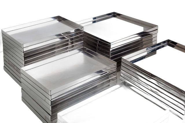 Phillips Starck Custom Stainless Steel Dishes, set of Thirty-Eight