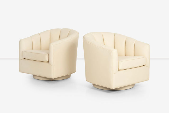 Pair of Ward Bennet Swivel Channel Back Lounge Chairs
