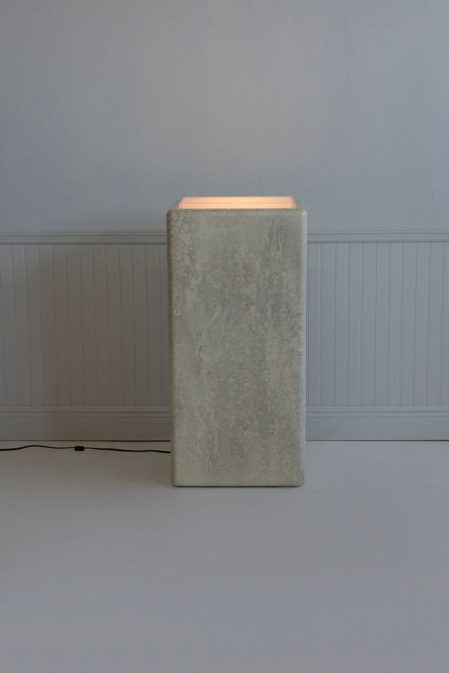 Illuminating Faux Travertine Pedestal