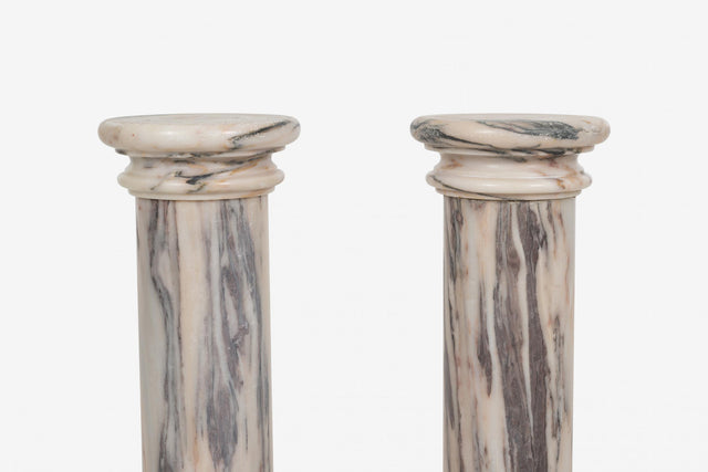 Pair of Marble Architectural Display Columns in Calacatta Pink Quarried in Italy.